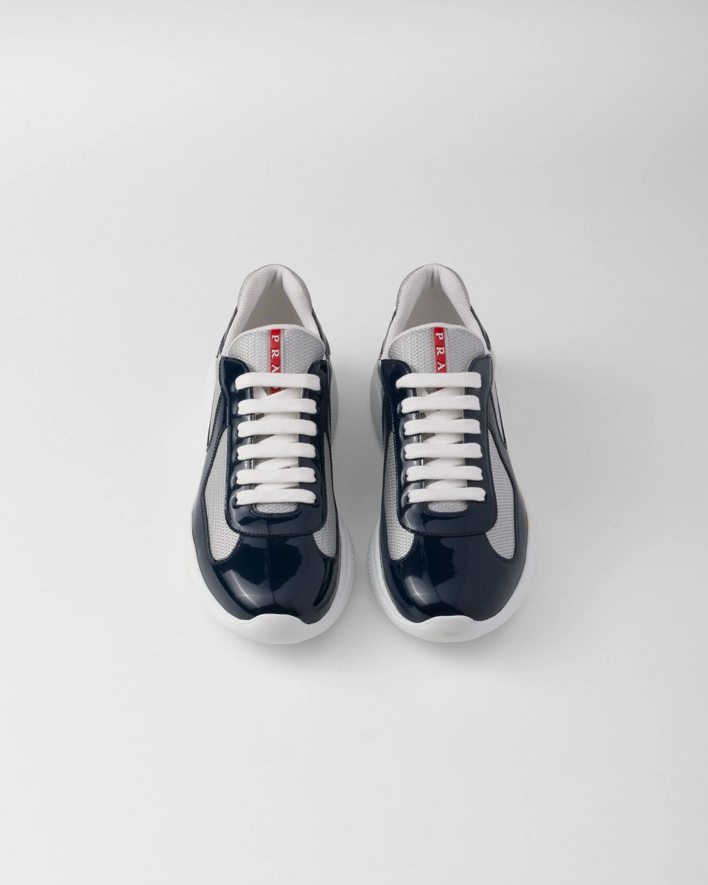 baskets Prada America's Cup en cuir verni bleu et mesh argenté