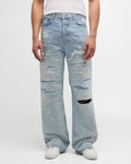 jean baggy Amiri Crystal-Embellished Repaired de couleur « Perfect Indigo ».