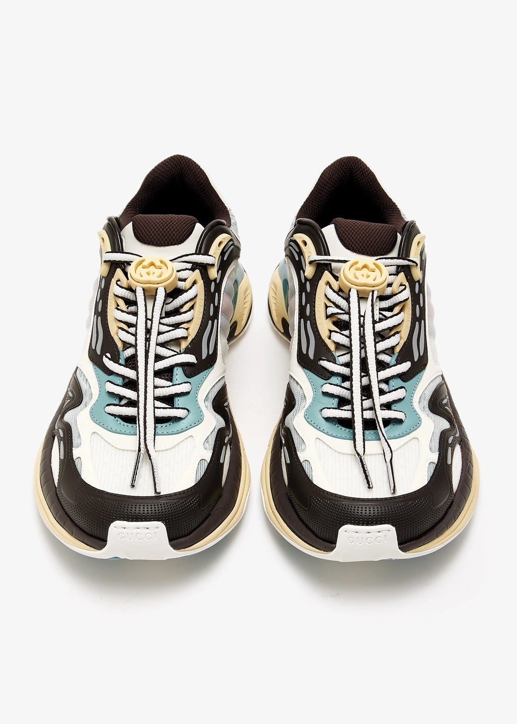 Baskets Gucci 2.0 dans un coloris blanc, marron et bleu clair.