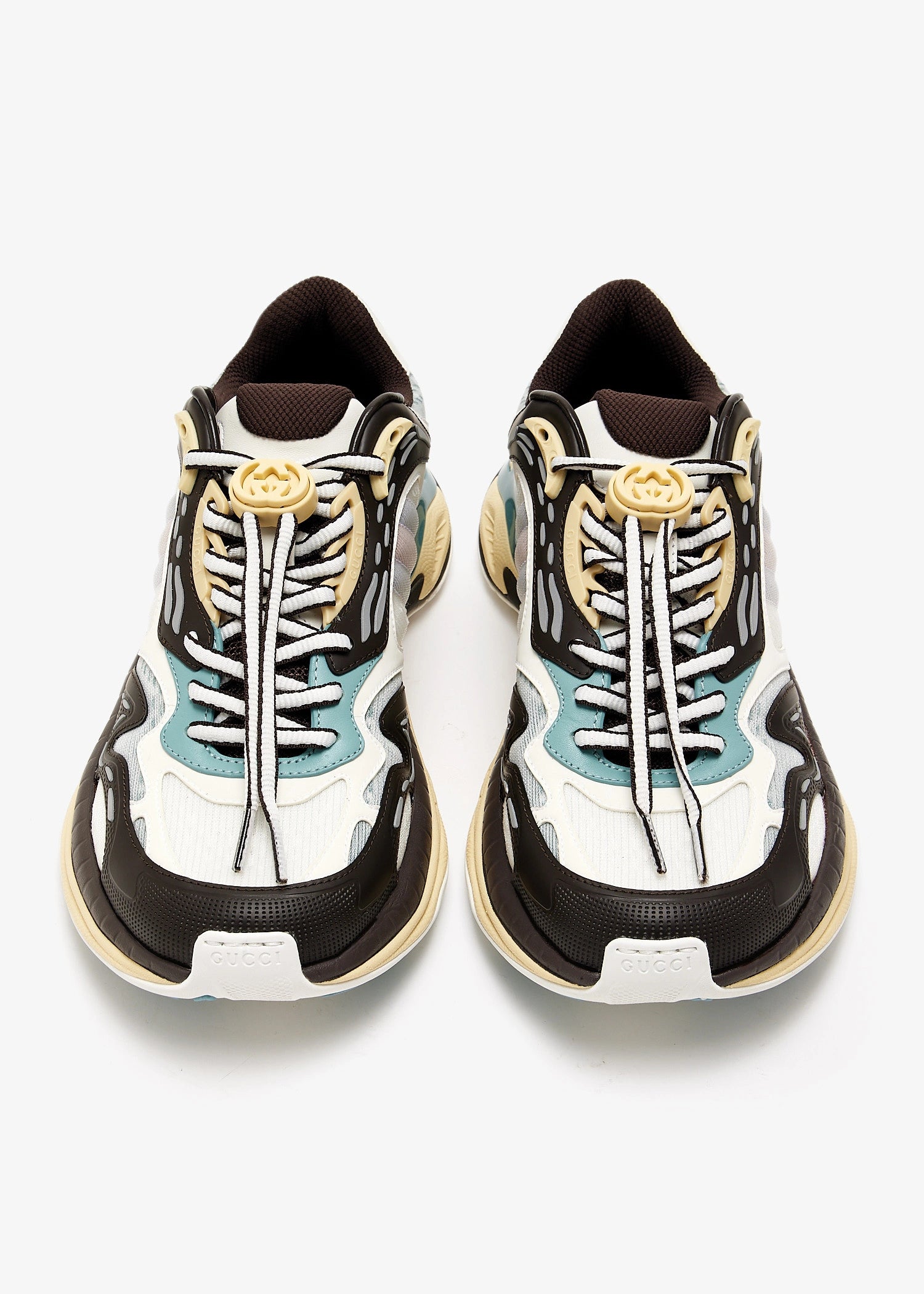 Baskets Gucci 2.0 dans un coloris blanc, marron et bleu clair.