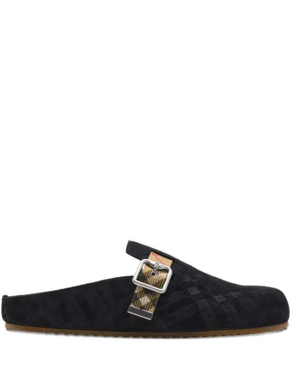 sabots "Urchin" en cuir velours de la marque de luxe Burberry.