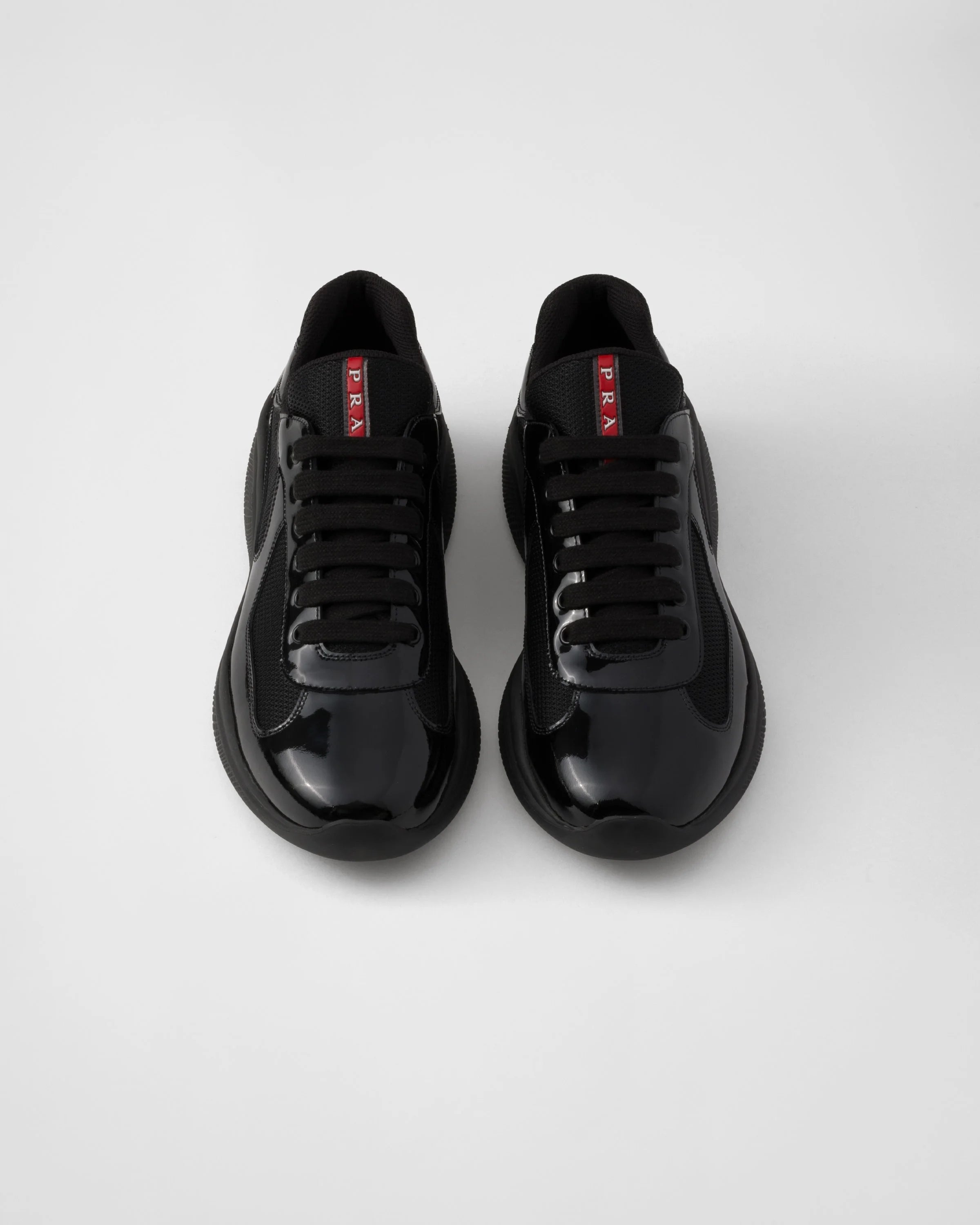 baskets Prada America's Cup en cuir verni noir