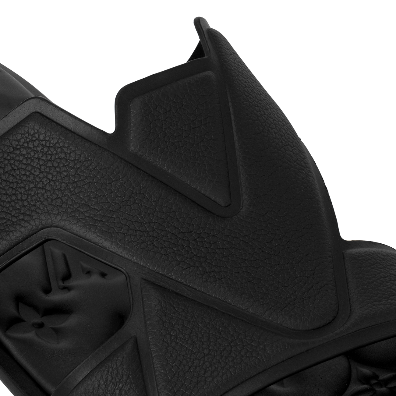 mules Louis Vuitton Oasis en cuir grainé noir présentent un motif LV entrelacé sur la bride