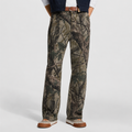 pantalon en jean à motif camouflage forestier hyperréaliste